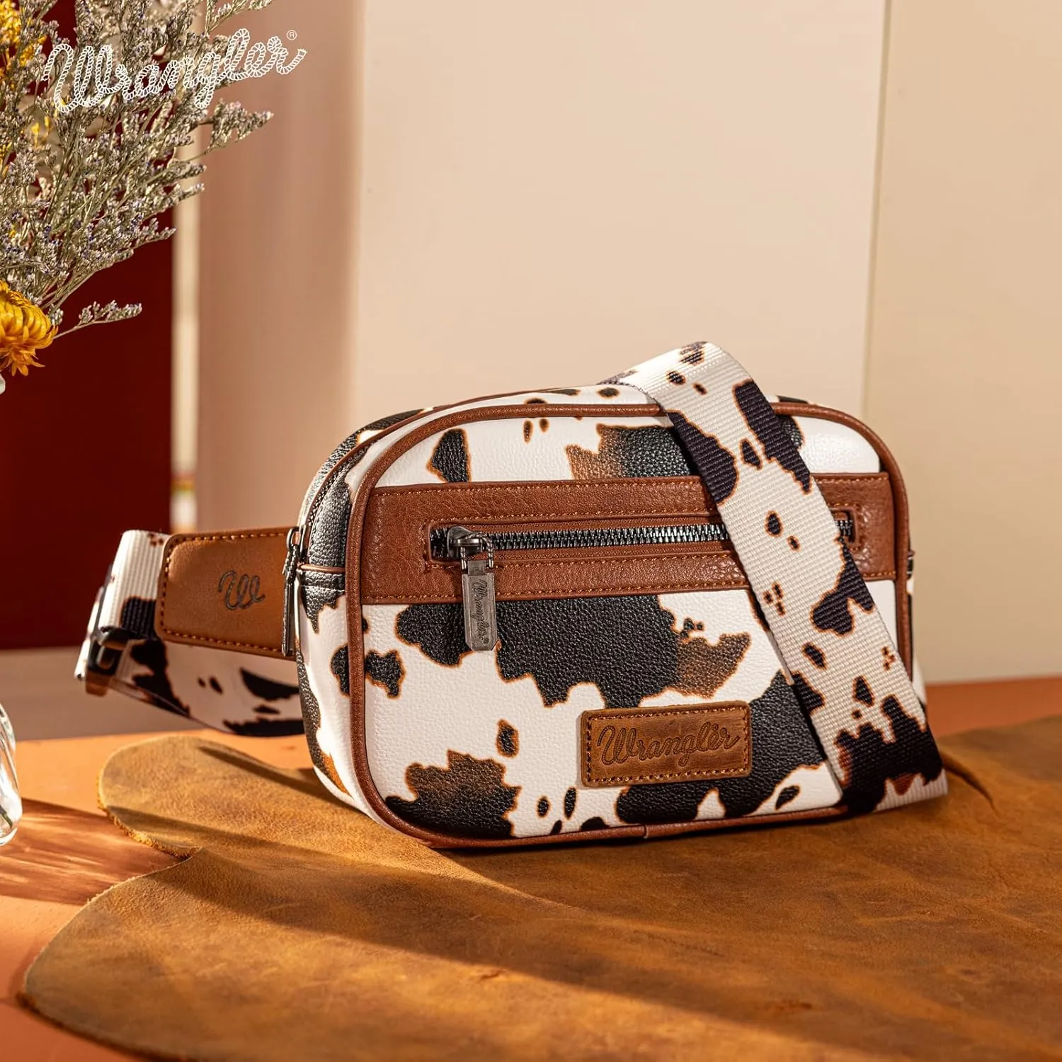 Wrangler Waist Pack for Women Cow Print Fanny Pack Men's Crossbody Belt Bag With Guitar Strap, Brown
